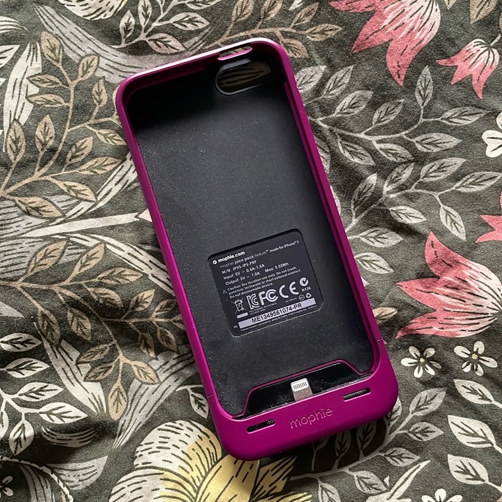Mophie rechargeable phone case. Raspberry wine color.